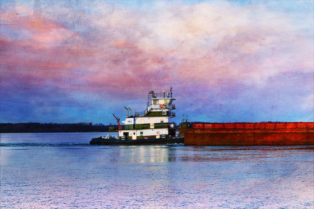 A tow boat pushes up-river in December, near Decatur, Alabama.